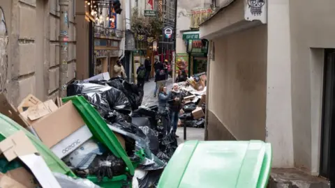 Getty Images Image shows uncollected waste n Paris