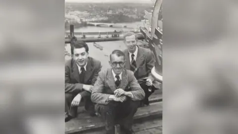 Frank Bright Frank Bright and two others on roof of Palace of Westminster