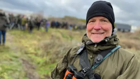 Stuart Woodward/BBC Bird watcher Simon Wood