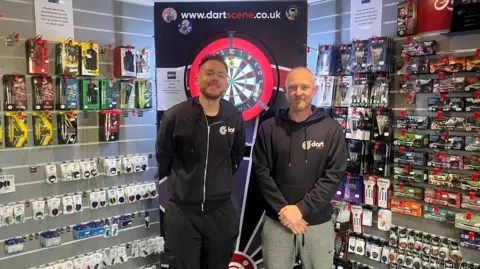 BBC Ryan Clarke (right) store manager Luke Schofield