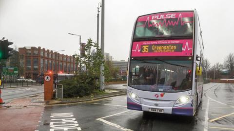 A First bus pulls out of Leeds Station