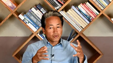 Getty Images This photograph taken on May 17, 2024 shows Sonam Wangchuk, a Ladakhi environmental activist speaking during an interview with AFP at his office in Leh, summer capital of the country's union territory of Ladakh, during the nation's ongoing general election. Buddhist monks and Muslims in the Indian Himalayan territory of Ladakh turned out to vote on May 20, demanding statehood and that their local culture be protected in the overwhelmingly Hindu nation. (Photo by Tauseef MUSTAFA / AFP) (Photo by TAUSEEF MUSTAFA/AFP via Getty Images)