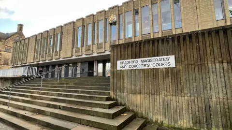 A photo of the steps and main entrance to Bradford Magistrates' Court.