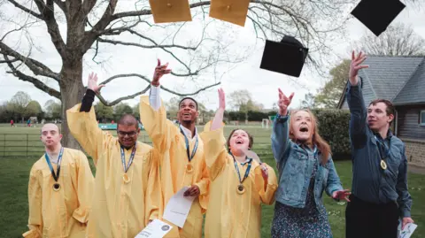 Kyle and friends at graduation