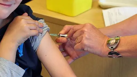 GETTY IMAGES A child receiving the MMR vaccine.