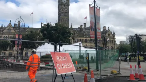 aisha iqbal/bbc Roadworks in front of Bradford's Centenary Square