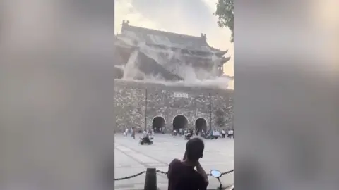 Roof of historic tower collapsing in China