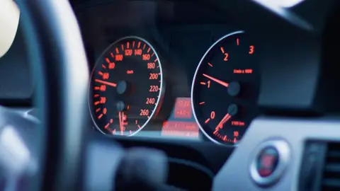 Close up of a car's control panel.