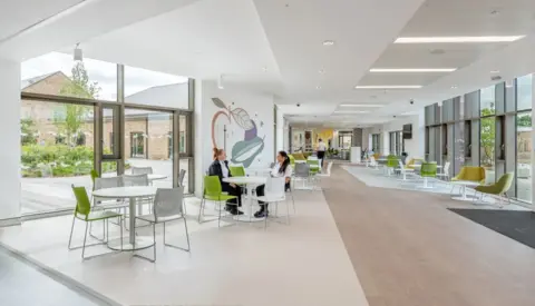 Chris Humphries HM Prison and Young Offender Institution Stirling - an internal view of a prison open space. light and airy