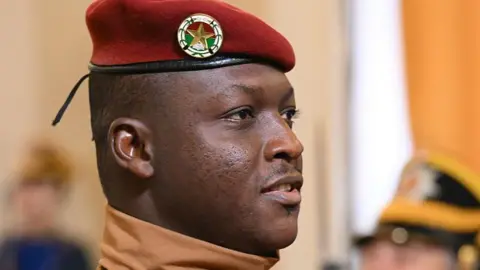 Capt Traoré in uniform and a red beret