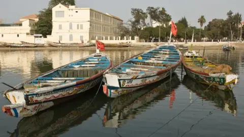 Getty Images  Three pirogues in a port