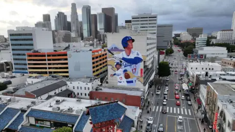 Getty Images A portrait of Dodgers player Shohei Ohtani has become a popular tourist attraction - especially by visitors from his native Japan