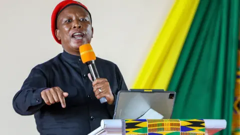 South African leader of the opposition party Economic Freedom Fighters (EFF) Julius Malema speaks during the launch of the Pan African Institute at Lukenya University in Makueni, Kenya - 9 November 2023