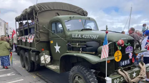 BBC Guernsey Liberation Day on 9 May 2023. An American World War Two troop-carrier truck takes part in Cavalcade on in St Peter Port

