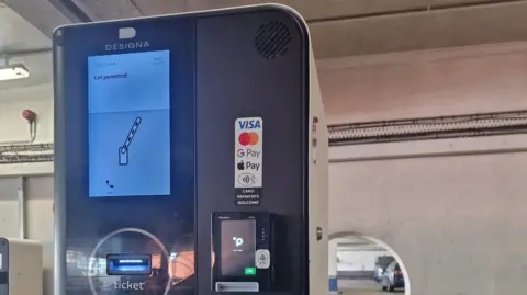 Yaditi Kava Close-up of ticket machine with digital screen