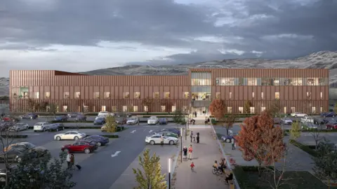 NHS Highland This is a generated image of what the new hospital building would look like. In the foreground there is a car park that has been laid out with a few trees. The building itself is long and three storeys high. The colour is a little like sandstone, which is a common building material in the HIghlands. Mountains can be seen in the background.