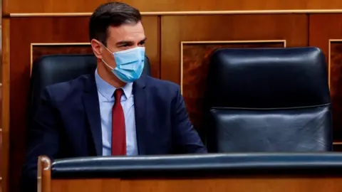 AFP Spanish Prime Minister, Pedro Sanchez wears a face mask during a parliamentary plenary session at the Lower Chamber of Spanish Parliament