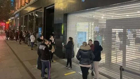 RTE The queue outside Penneys on Mary Street in Dublin before it opened this morning