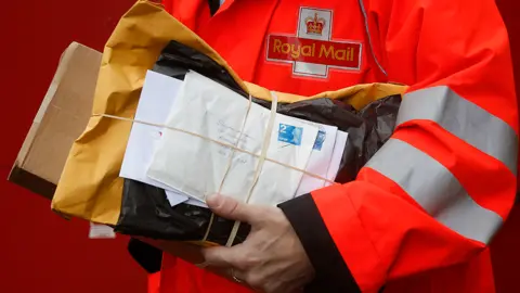 Getty  Royal Mail worker