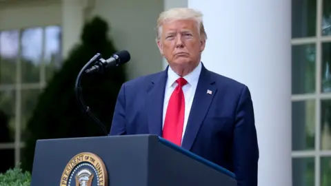 Reuters US President Donald Trump at podium