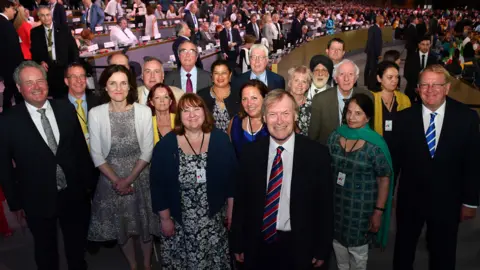 Getty Images The British delegation including Theresa Villiers MP, Sir David Amess, Matthew Offord MP and Roger Godsniff MP pose during the Conference In Support Of Freedom and Democracy In Iran on June 30, 2018 in Paris, France.