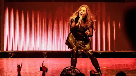 Becky Hill opens for Katy Perry at Unipol Arena on November 02, 2025 in Bologna, Italy.