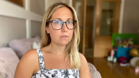 Robby West/BBC Lisa Palmer