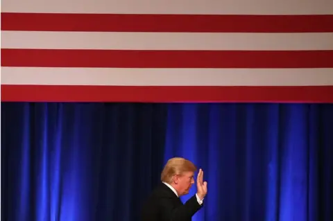 Getty Images Trump waving in 2017