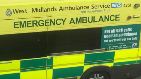 A West Midlands Ambulance Service ambulance is parked