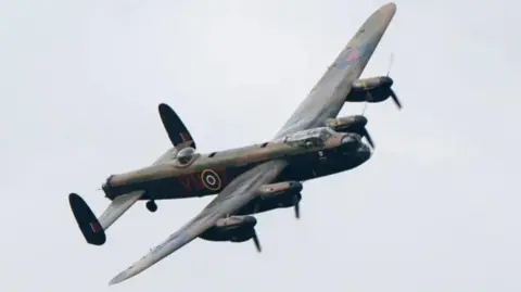 PA Media Avro Lancaster PA474 banking to starboard 