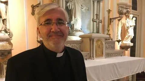 Father Guillermo Marcó