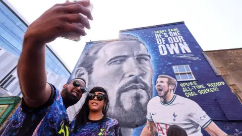 Getty Images Harry Kane fans outside mural