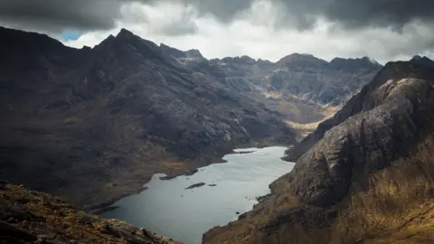 The jagged, rocky Cuillin Mountains with Loch Coruisk below.