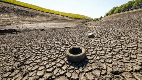 Danny Lawson/PA Dried up reservoir