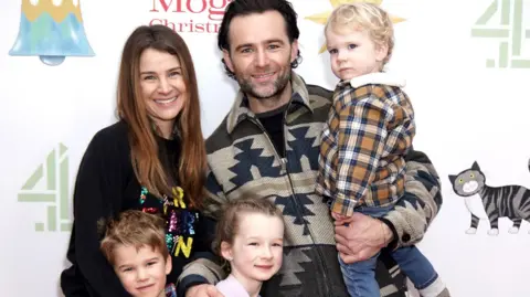 PA Media The Judd family at a premiere.