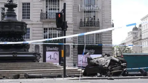 PA Media A black car crashed in Piccadilly Circus