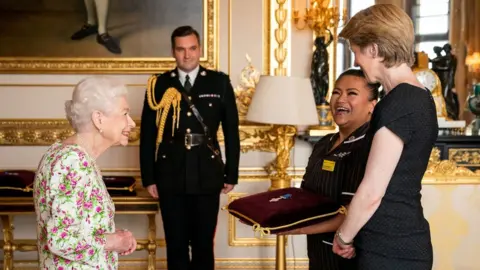 PA Media May Parsons with the Queen