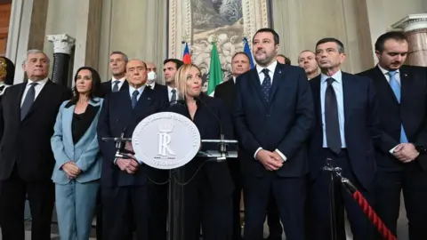 ETTORE FERRARI/EPA-EFE (L-R) Antonio Tajani, Licia Ronzulli, Antonio De Poli, Former premier and leader of the Forza Italia (FI) party Silvio Berlusconi, Alessandro Cattaneo, President of the Brothers of Italy party (Fratelli d'Italia), (FdI) Giorgia Meloni, Francesco Lollobrigida, Italian Lega party leader Matteo Salvini, Massimiliano Romeo, Maurizio Lupi and Riccardo Molinari