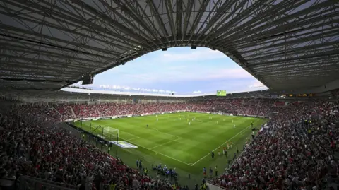 Fans inside the Nagyerdei Stadium in Debrecen watch Hungary v Kazakhstan