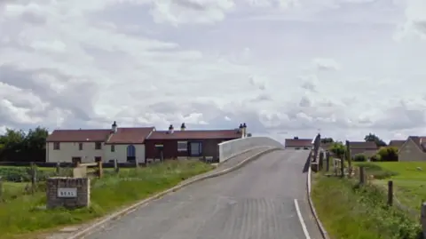 A bridge heading into the village of Beal