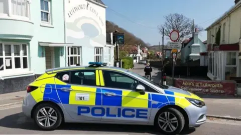 Purbeck Police Police car in Lulworth