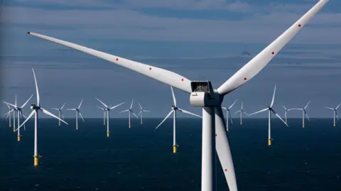 Getty Images dozens of wind turbines in the sea