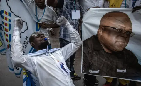 AFP Tshisekedi supporter celebrating