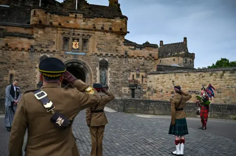 Getty Images Piper at Edinburgh Castle
