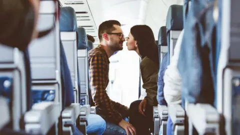 izusek Couple on plane