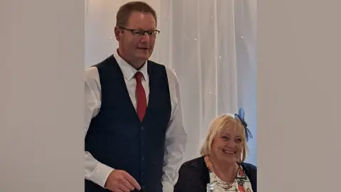 Family handout Mark Taylor and wife Carole