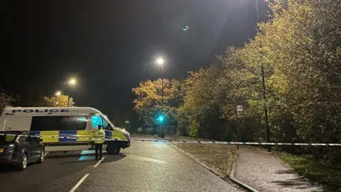 Charlotte Leeming/BBC Police cordon