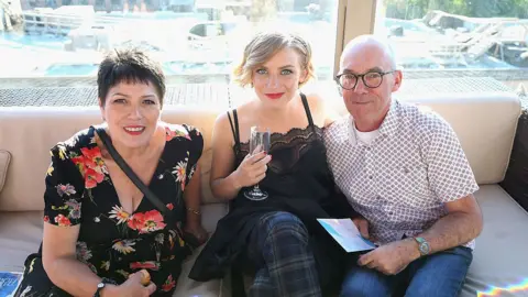 Getty Images Sian James (far left) and LGSM co-founder Mike Jackson (far right) , with actress Faye Marsay at the 2014 Toronto International Film Festival