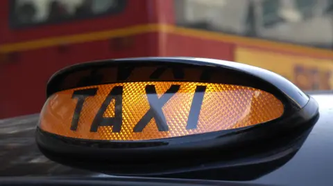 BBC Taxi sign on cab 