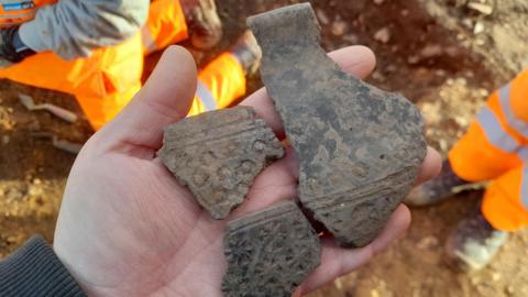 The Anglo-Saxon pottery discovered by archaeologists.